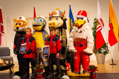 Maskottchen mit Festschrift